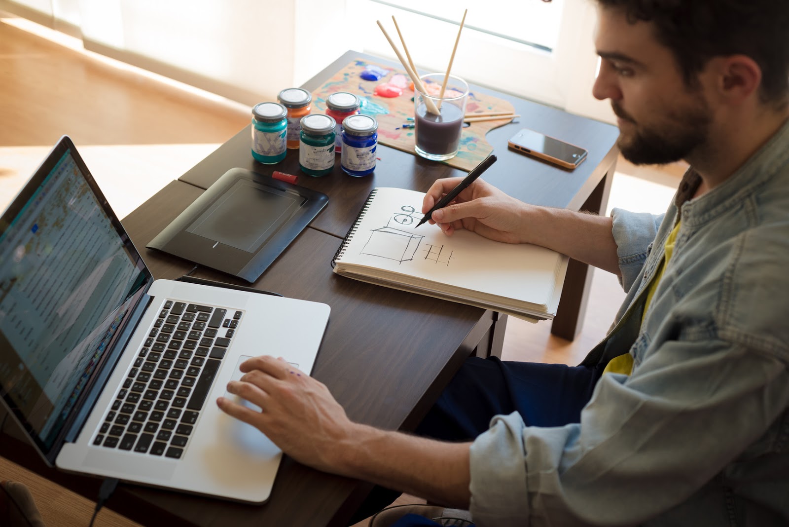 photodune-8036932-handsome-hipster-modern-man-working-home-using-laptop-m